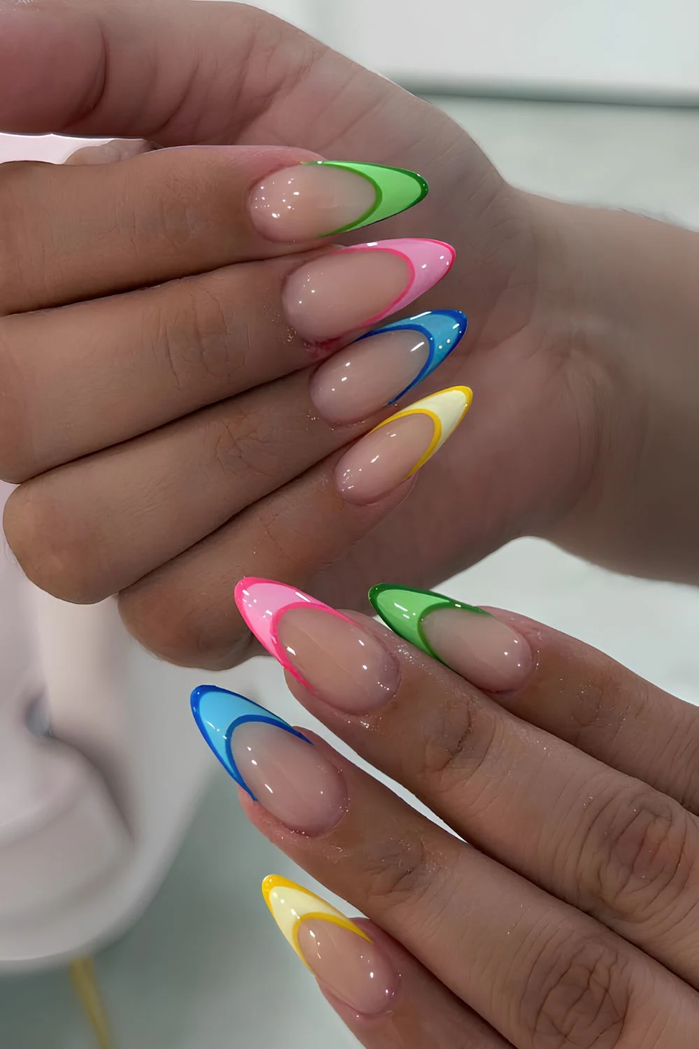 Outlined skittle French manicure
