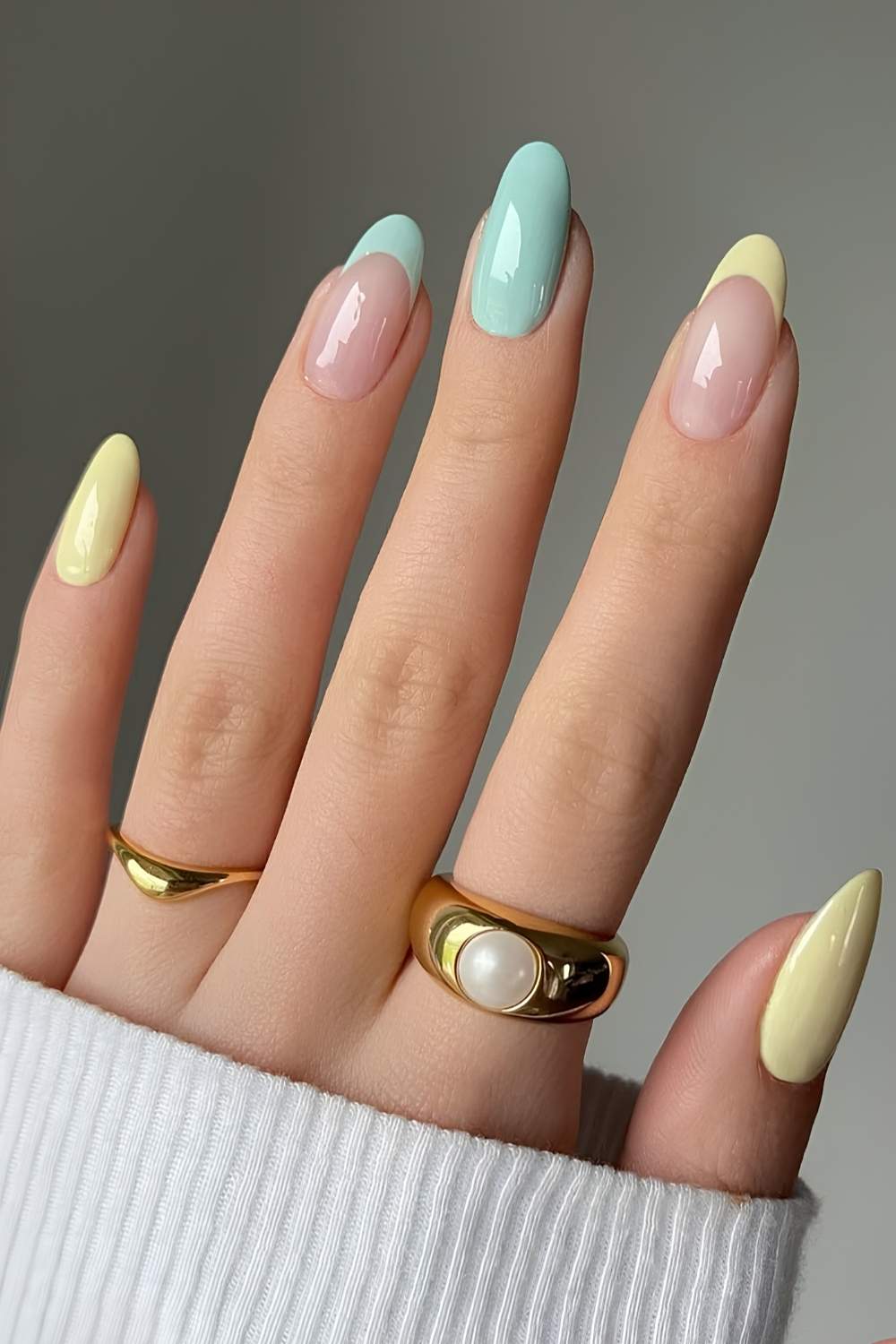 Pastel blue and yellow solid and French tip mix nails