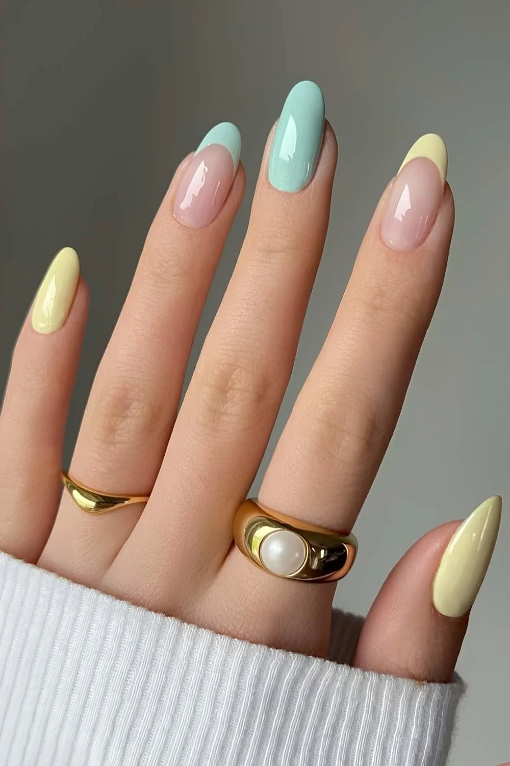 Pastel blue and yellow solid and French tip mix nails