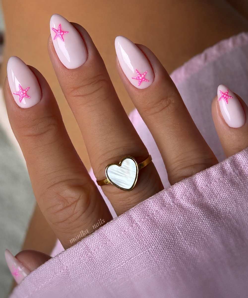 Pastel pink mani with hot pink starfish art