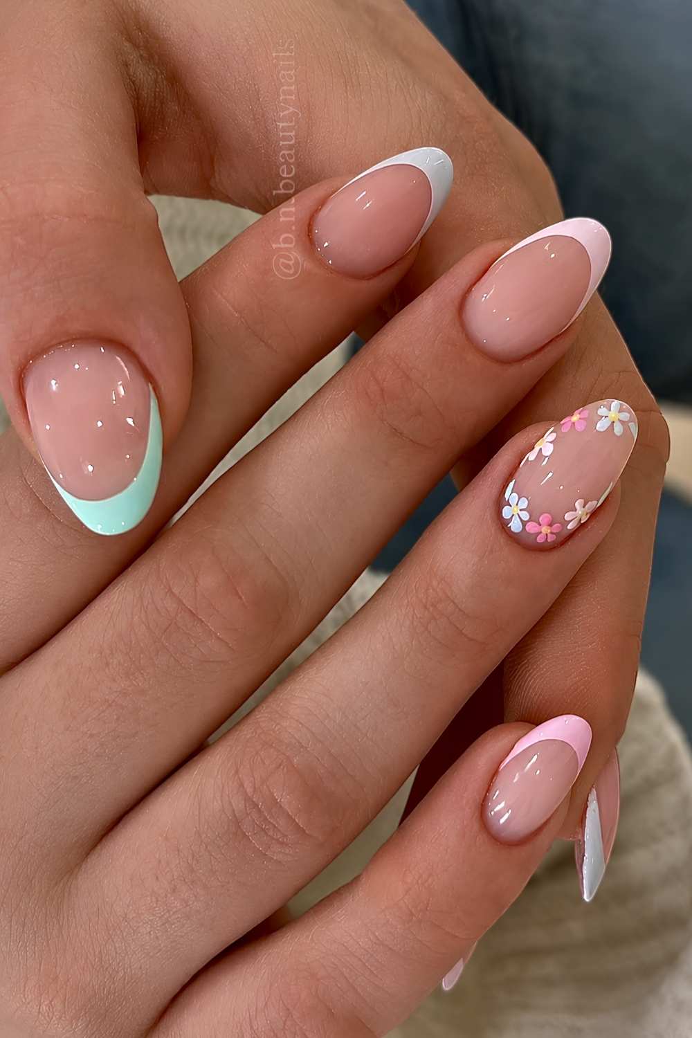 Pastel skittle French nails with dainty flowers