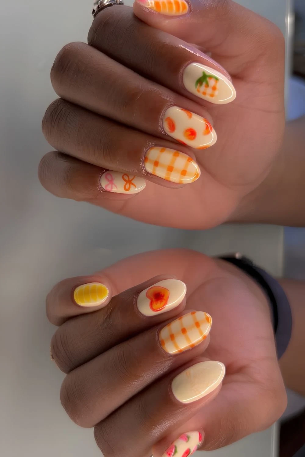 Peach picnic inspired nails with gingham and fruit art