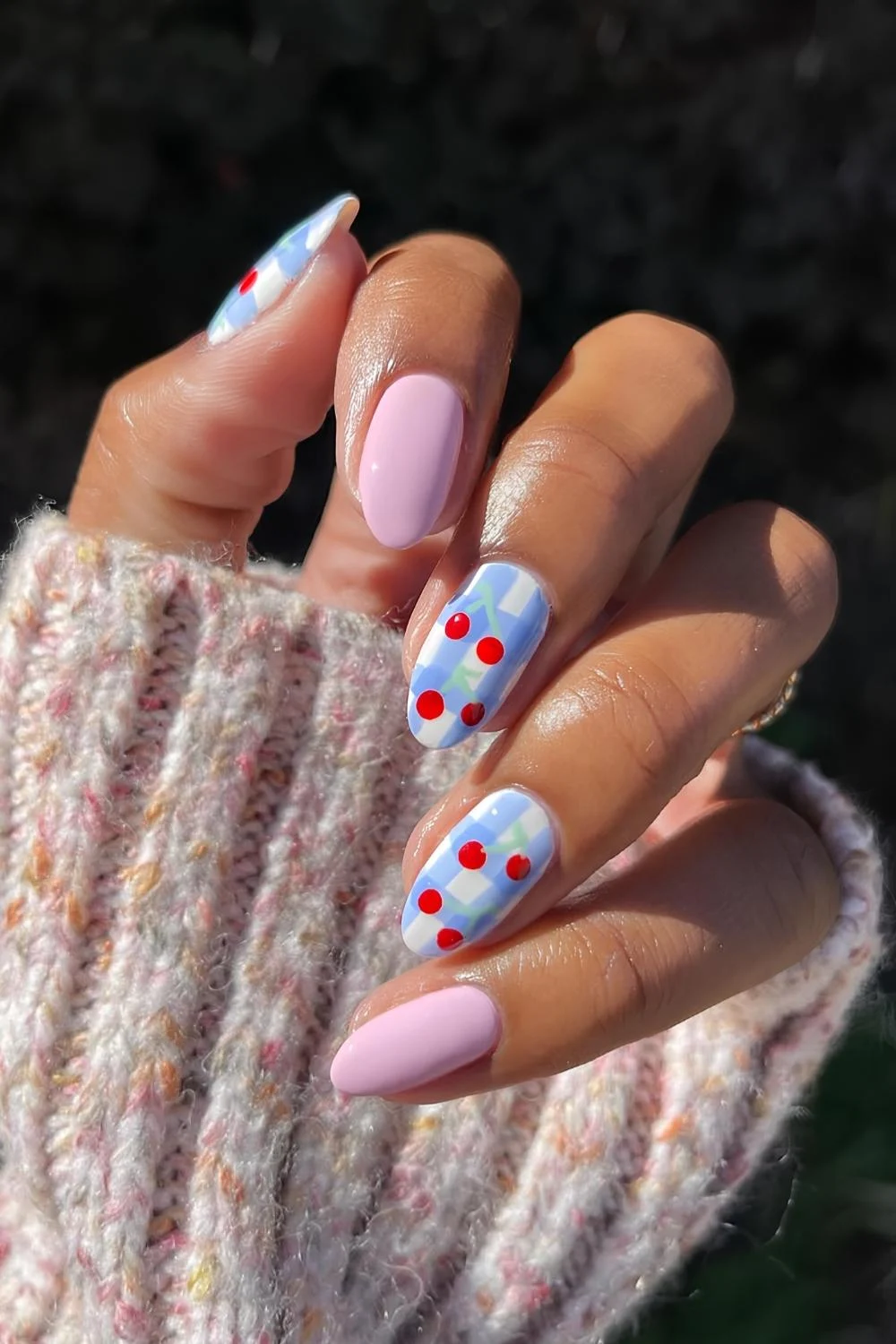 Pink and blue nails with gingham and cherries