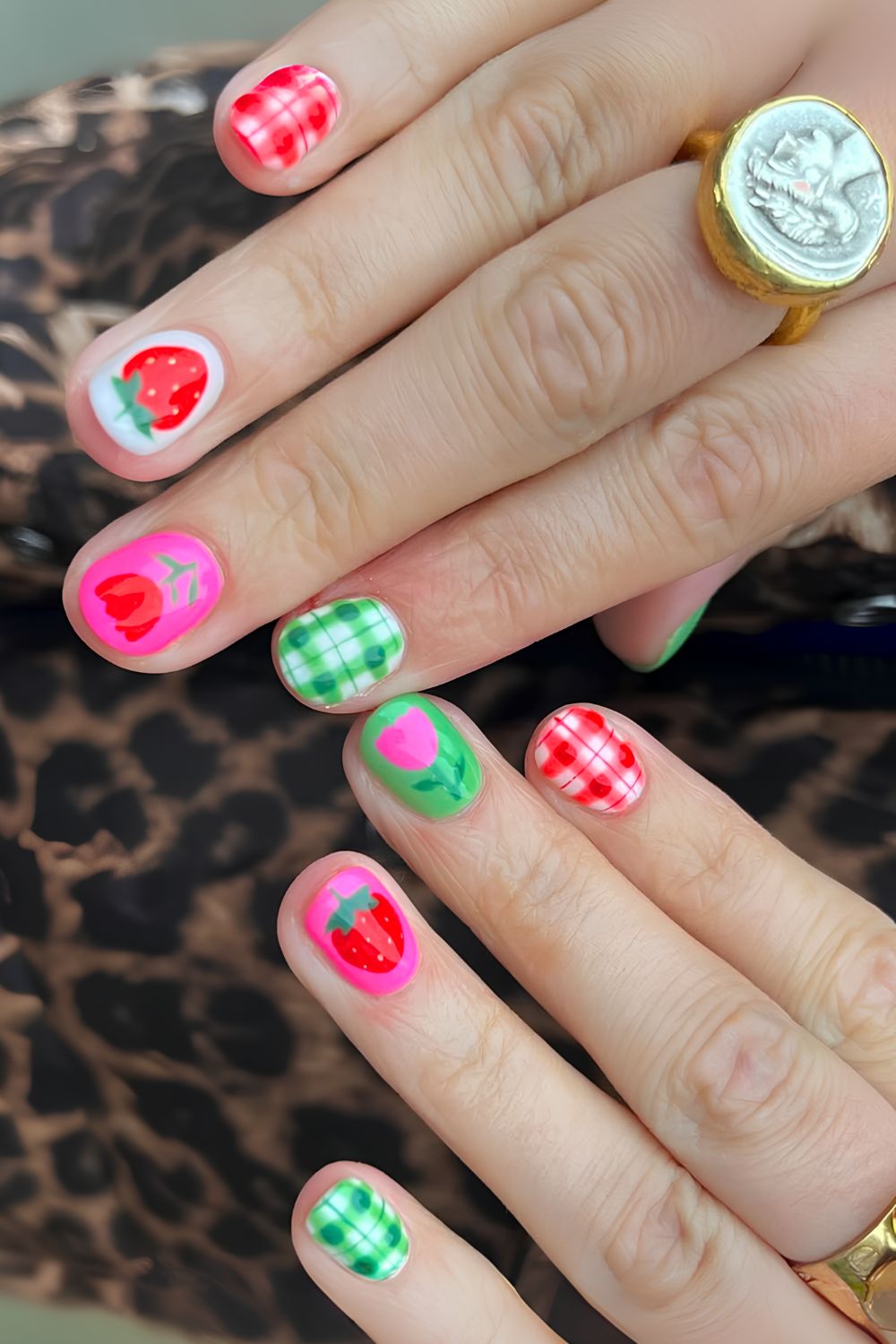 Pink and green picnic mani with strawberries and gingham
