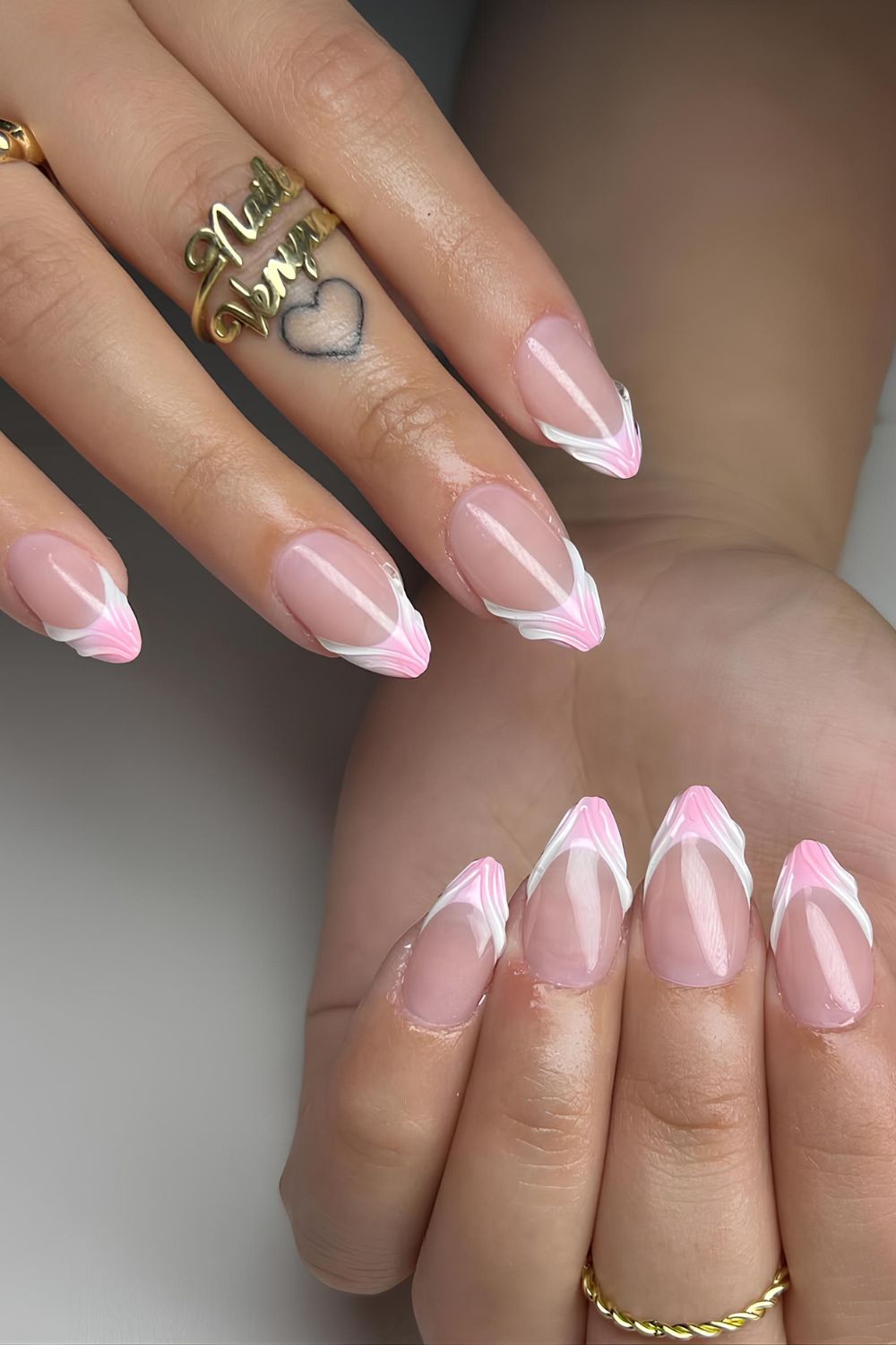 Pink and white textured French tip nails