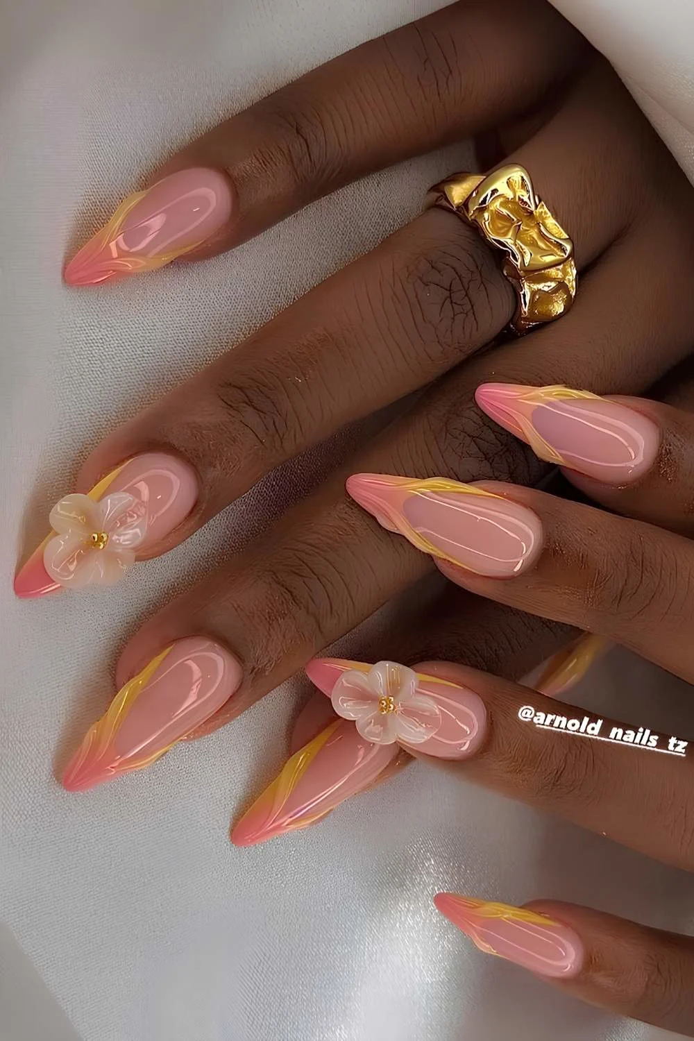 Pink and yellow French mani with sculpted flowers