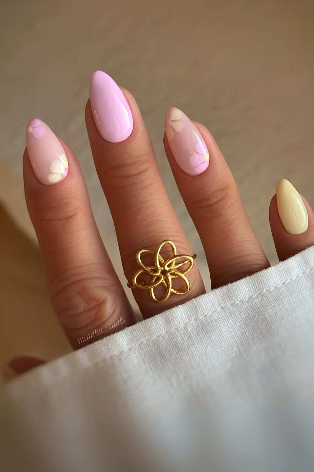 Pink and yellow nails withh blooming gel flowers