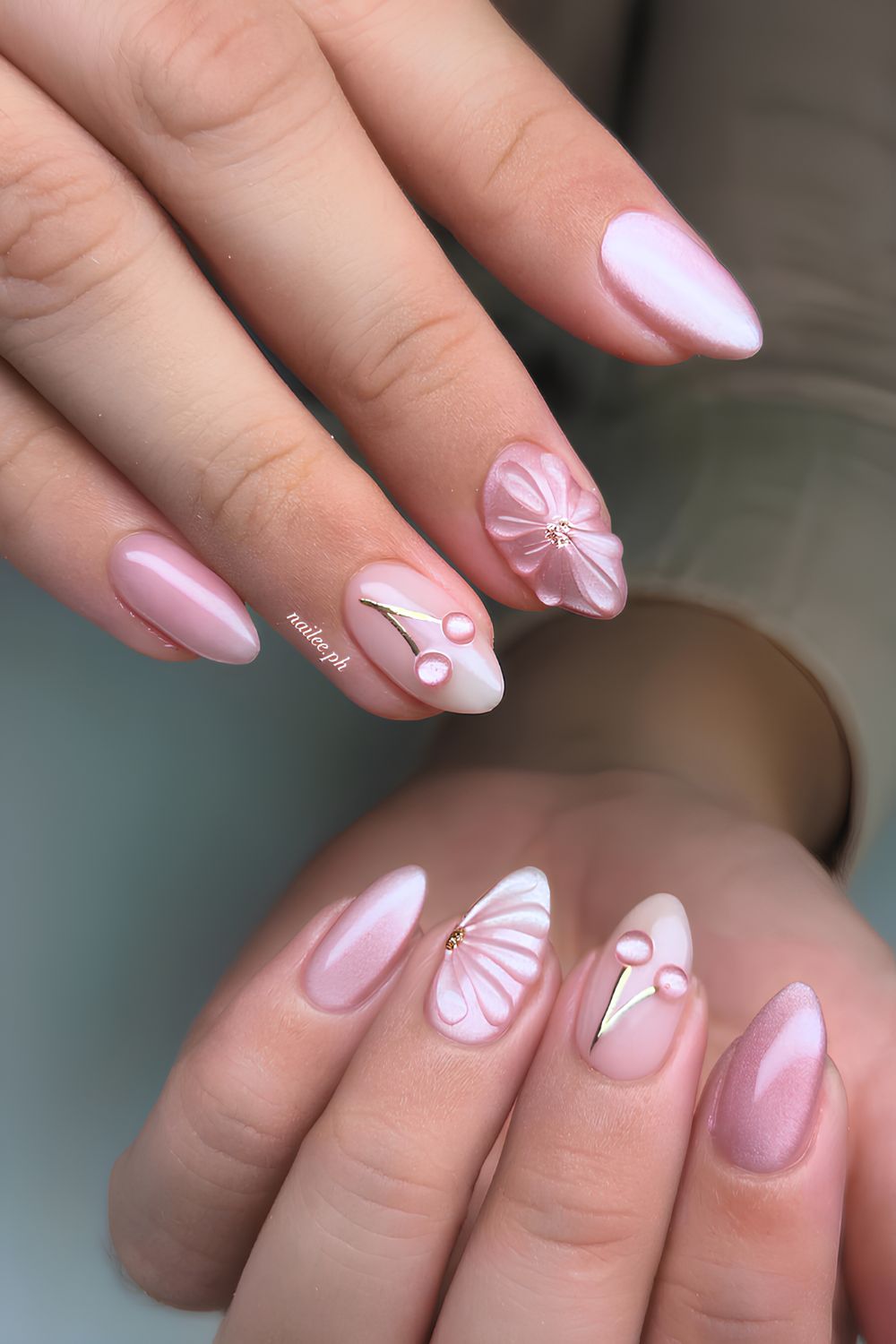 Pink cat eye mani with textured swirls and cherry art