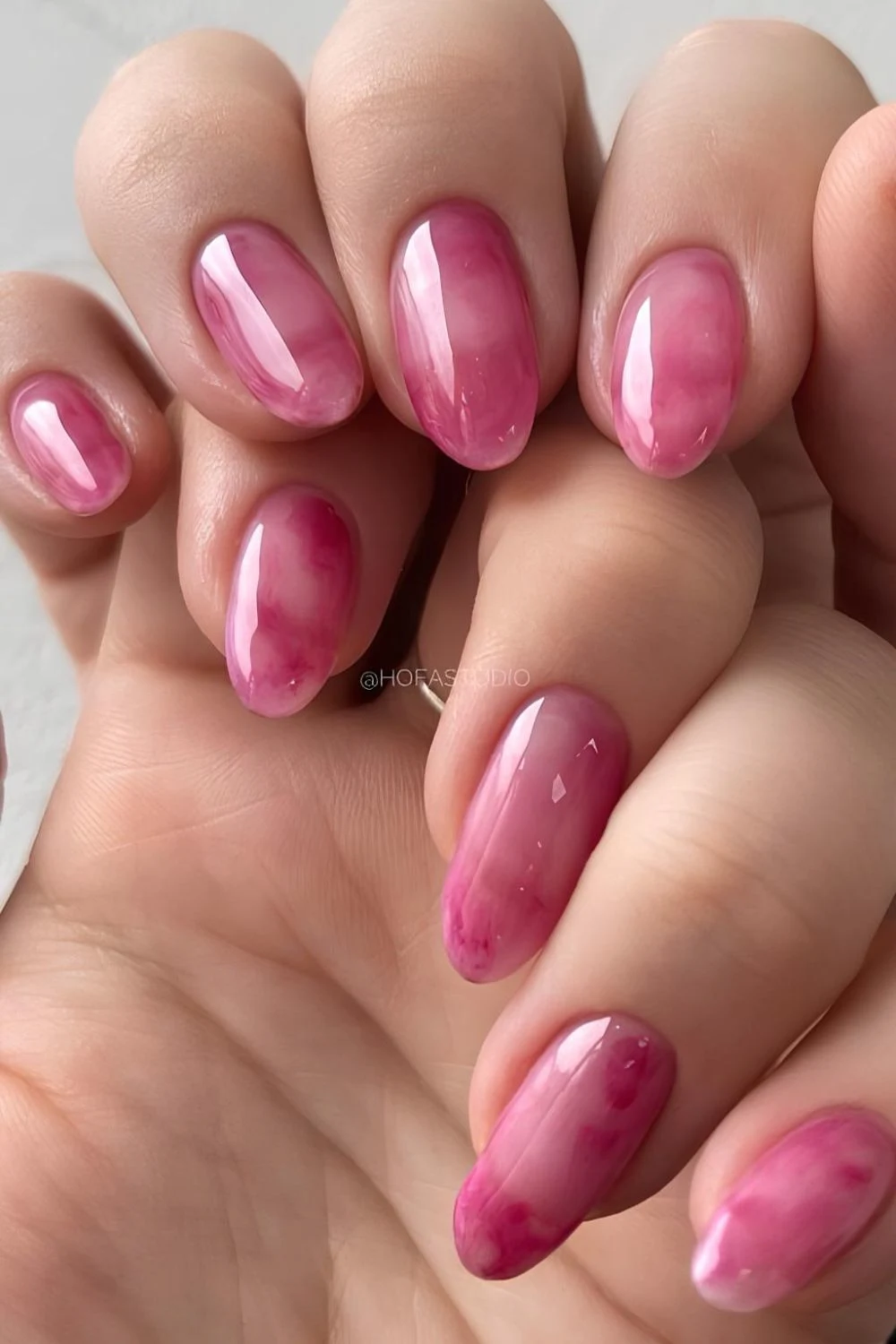 Pink marble nails with jelly finish
