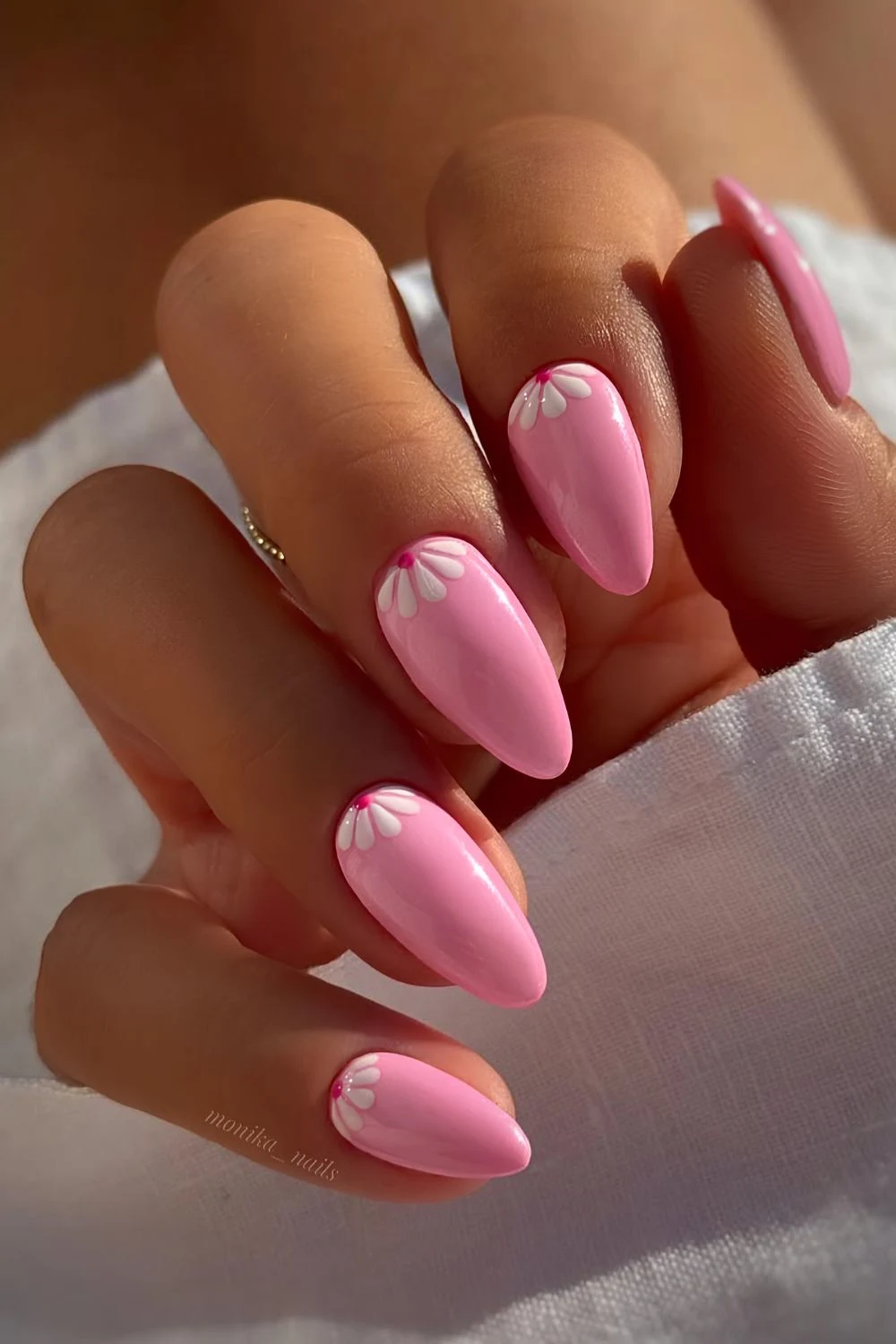 Pink nails with white petals on cuticles