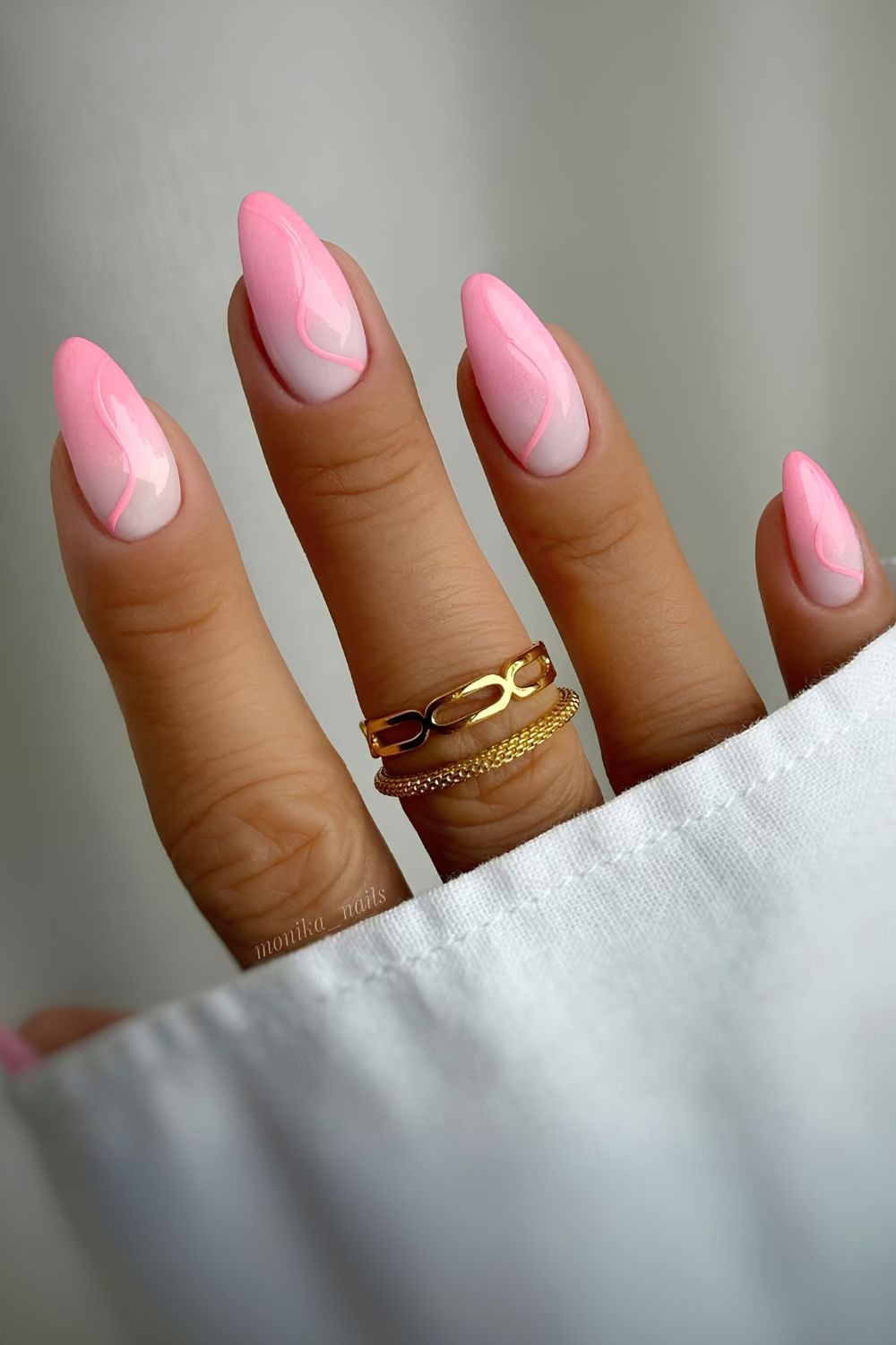 Pink ombre nails with swirl art