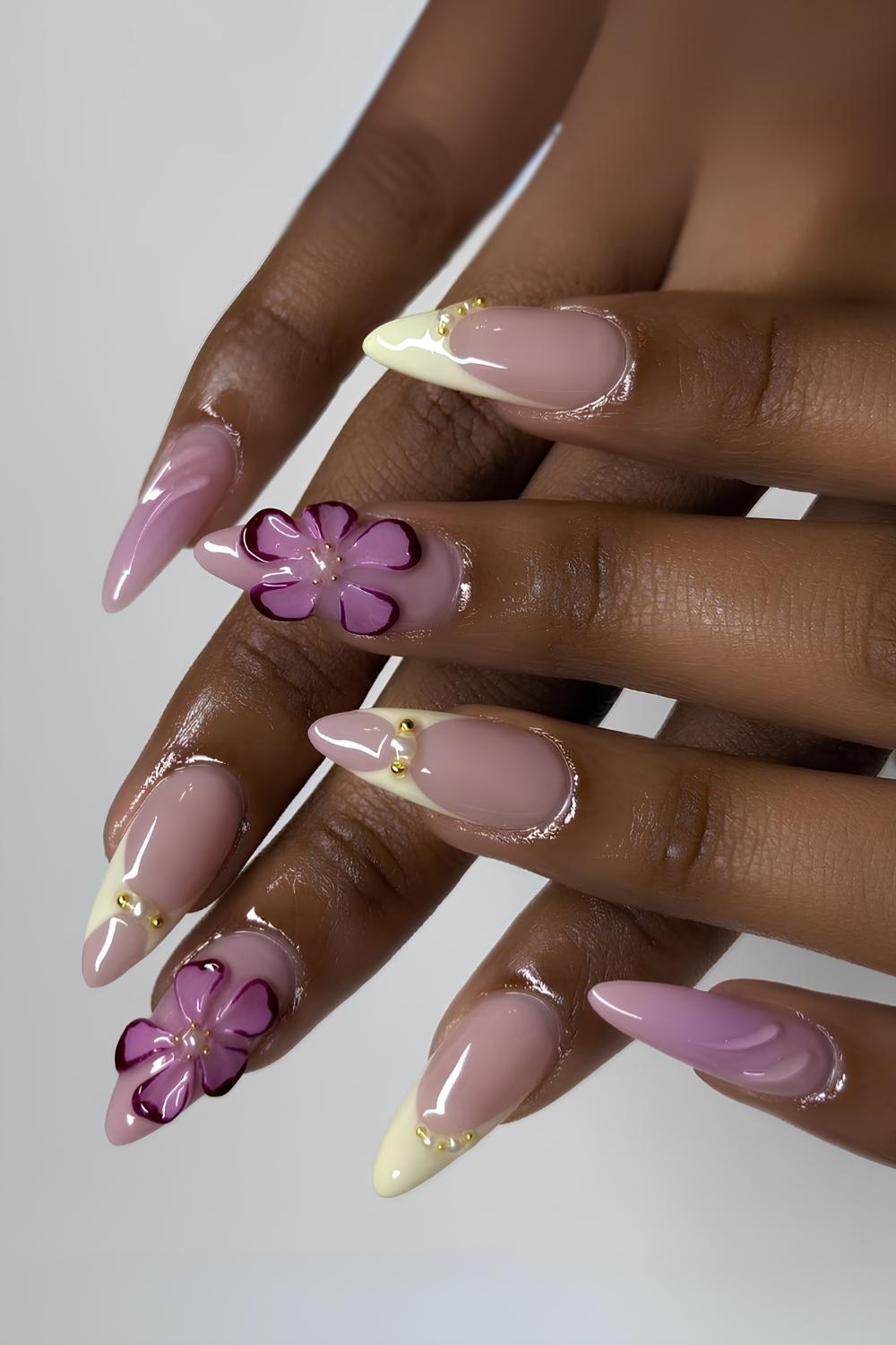 Purple and yellow nail with sculpted florals