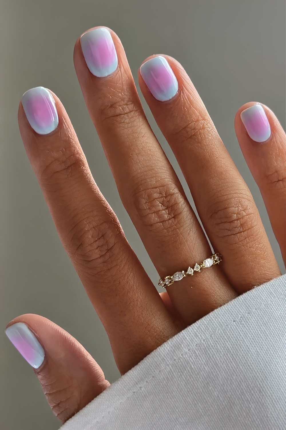 Short baby blue and pink aura nails