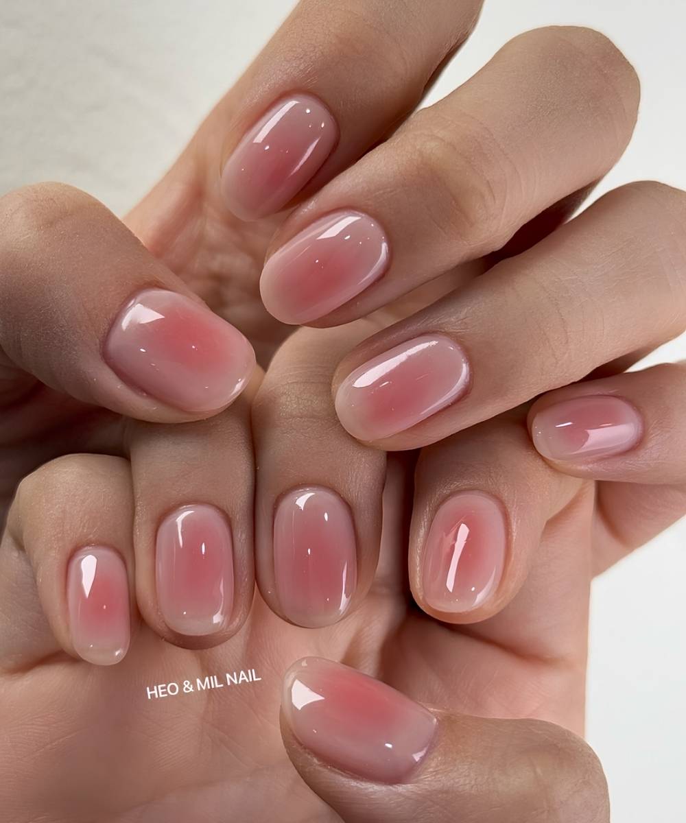 Short jelly pink aura nails