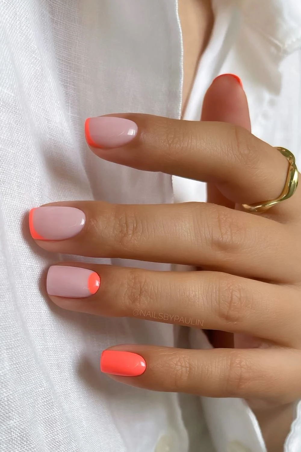 Solid orange and micro French nails combo with half moon accent