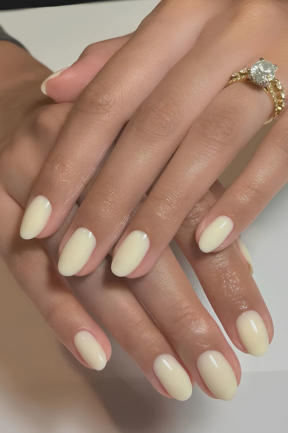 Solid pastel yellow manicure