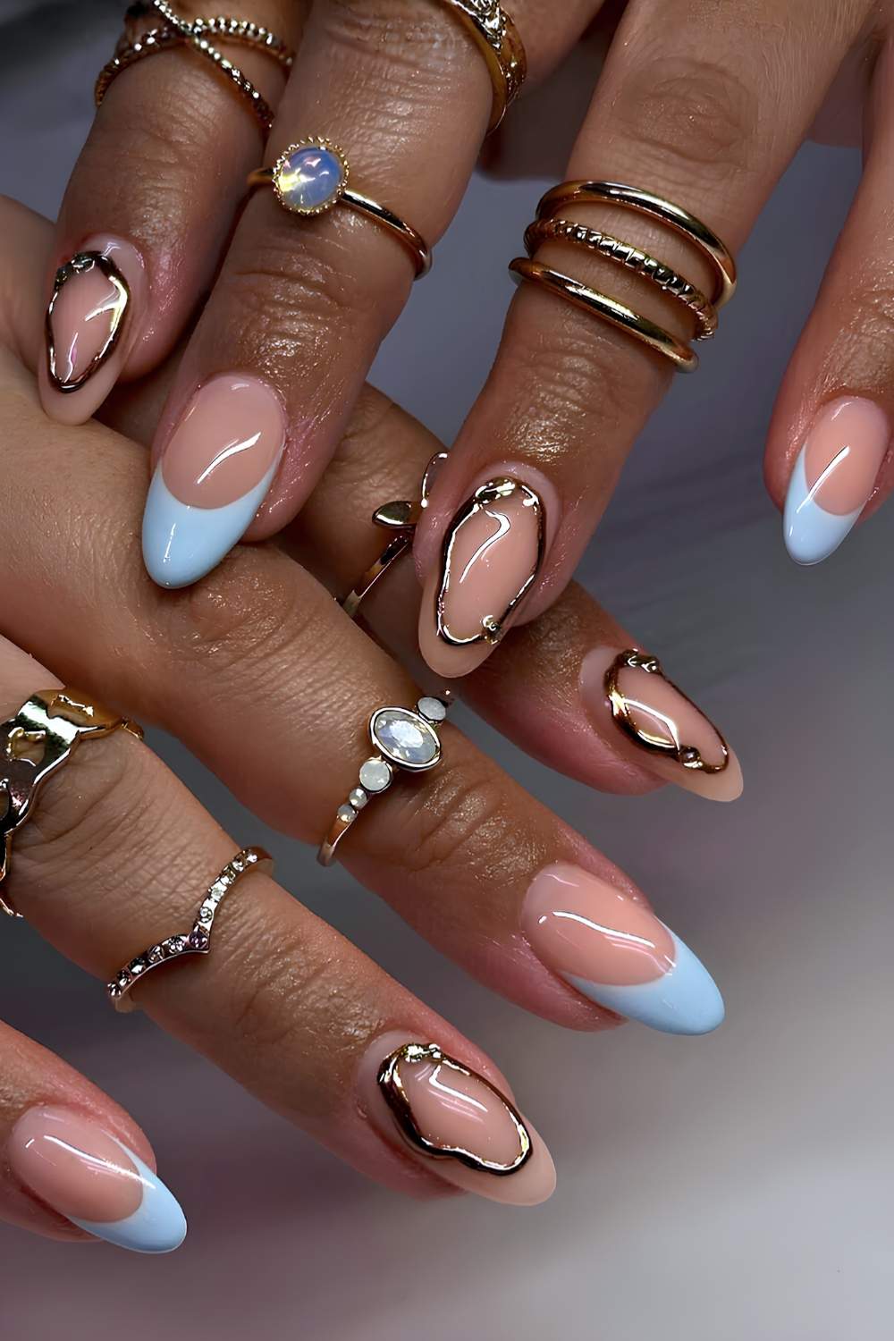 Thick blue French mani with gold details