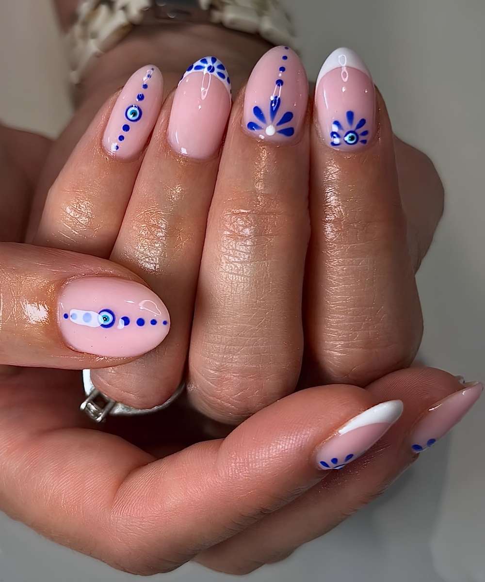 White French mani with blue flower and nazar art