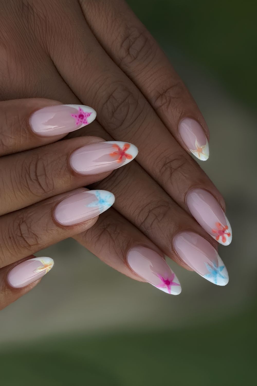 White French tips with colorful starfish design