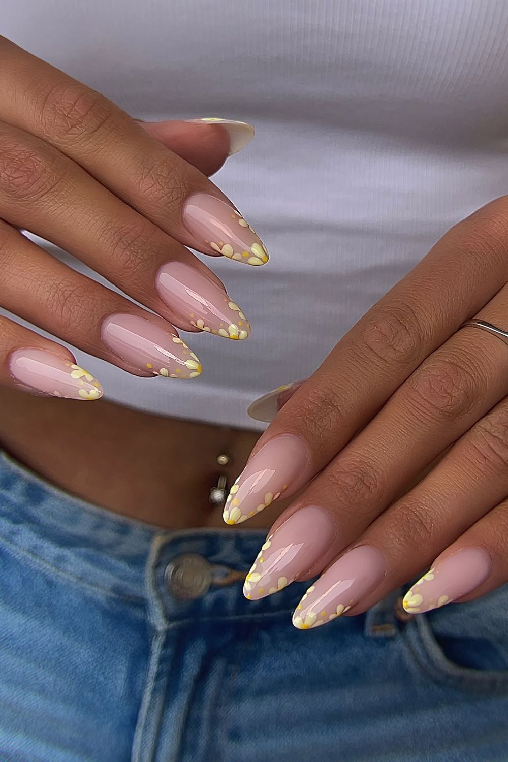 Yellow floral French tip nails