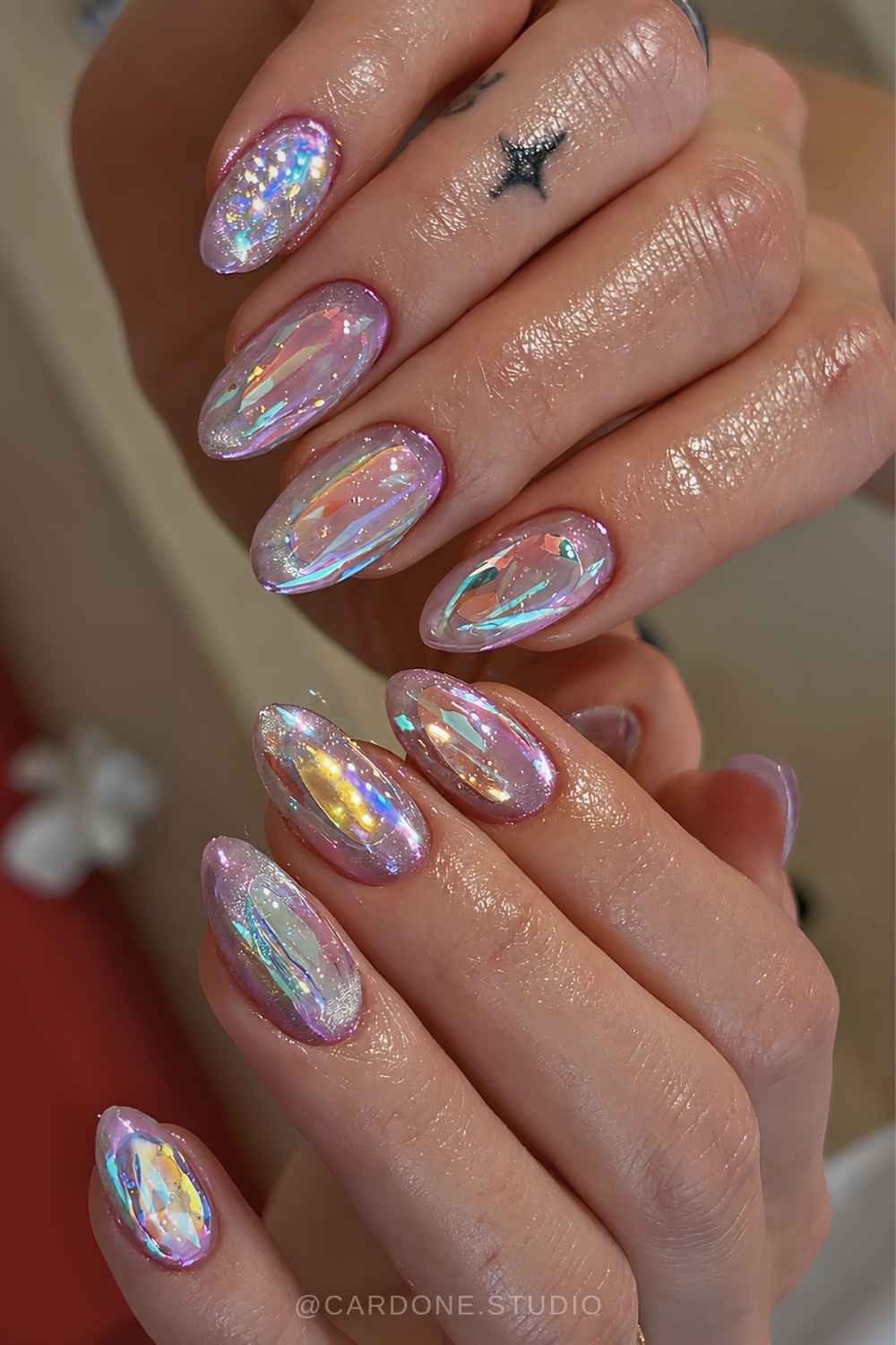 Aurora cat eye mani with colorful holo flakes