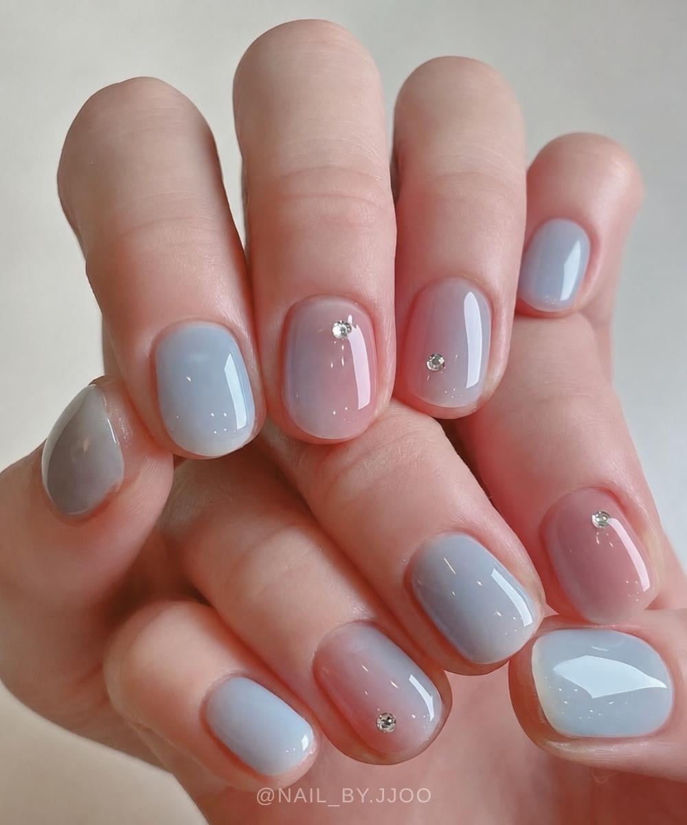 Baby blue jelly nails with gems