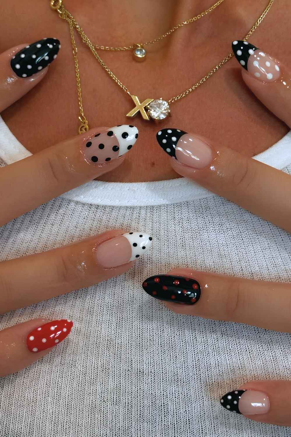 Black and red polka dot nails