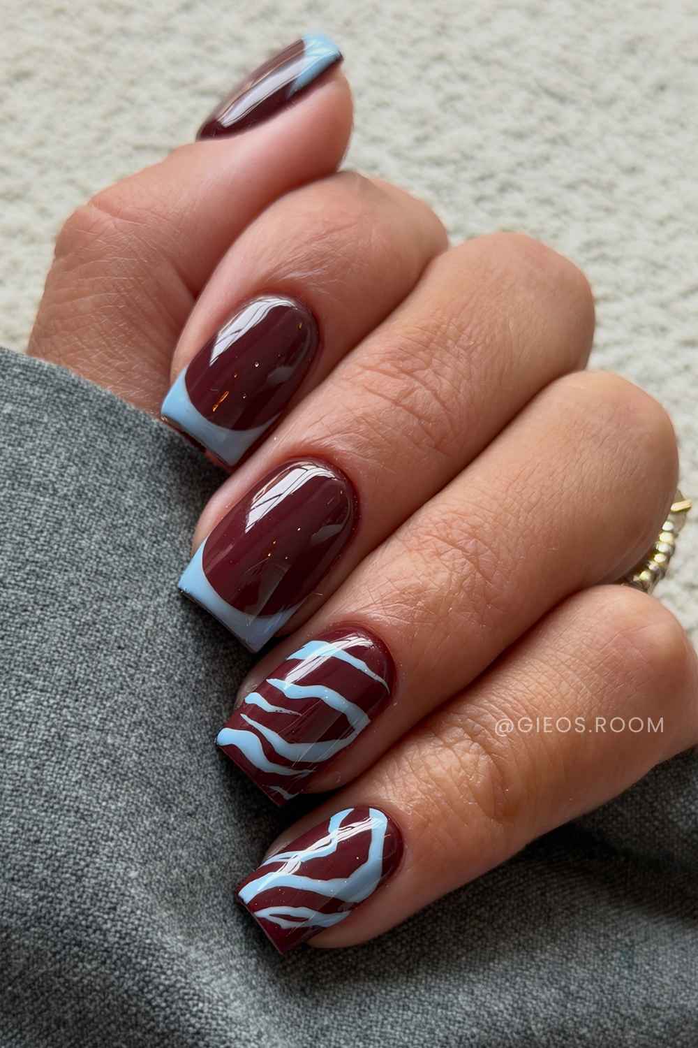 Blue and brown nails with zebra print