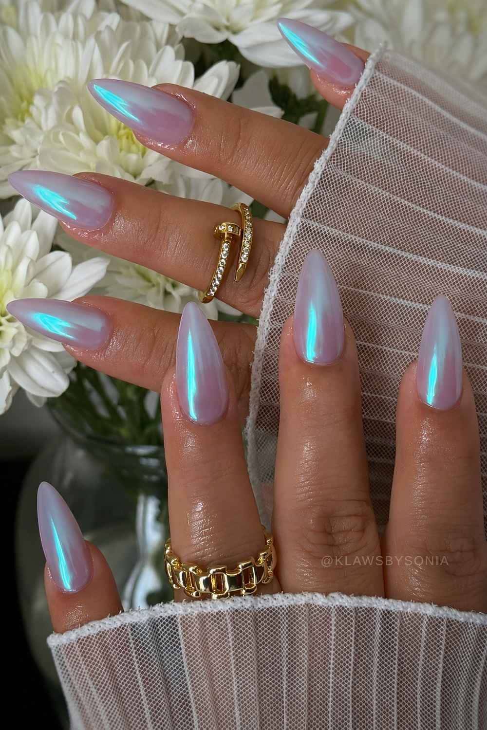 Blue chrome aurora manicure