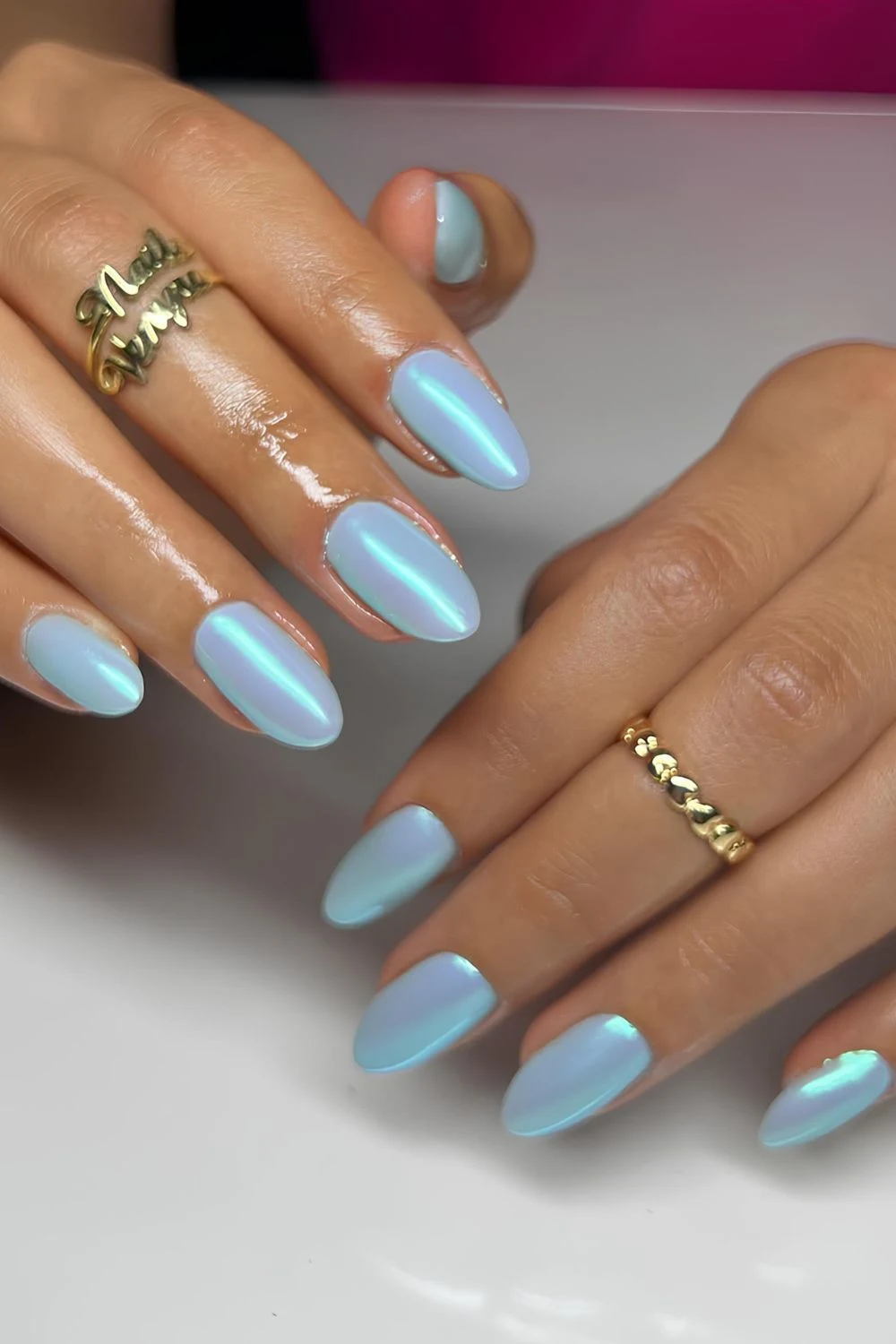 Blue chrome aurora nails