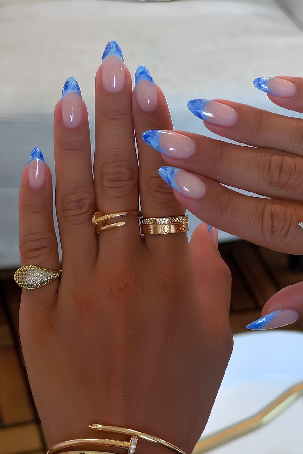 Blue marble French tip manicure