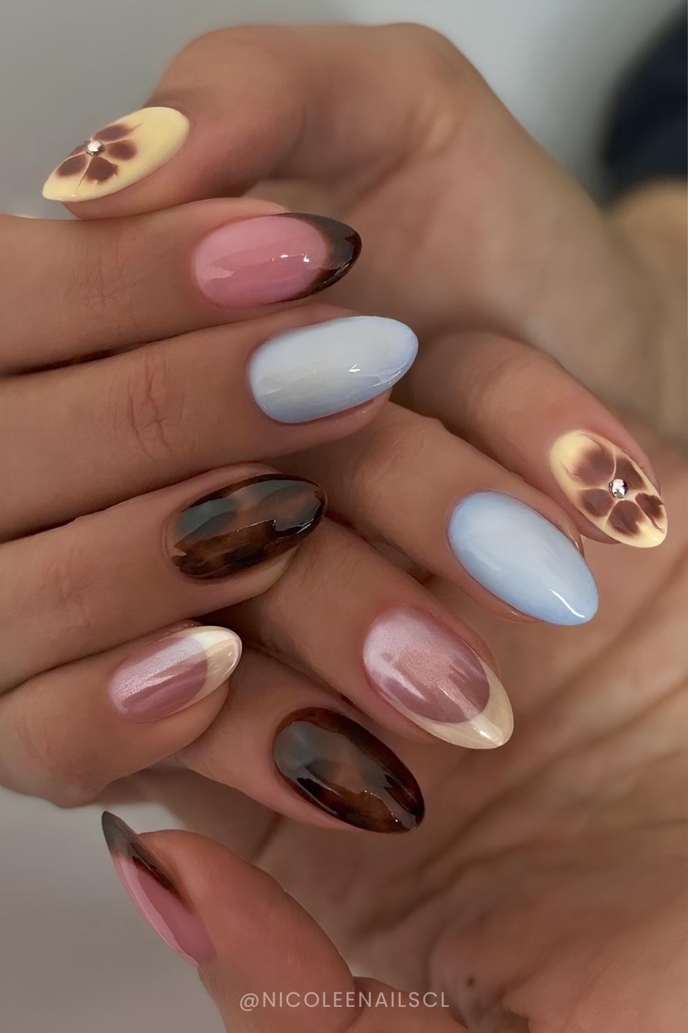 Brown and blue mani with blooming gel and tortie accents