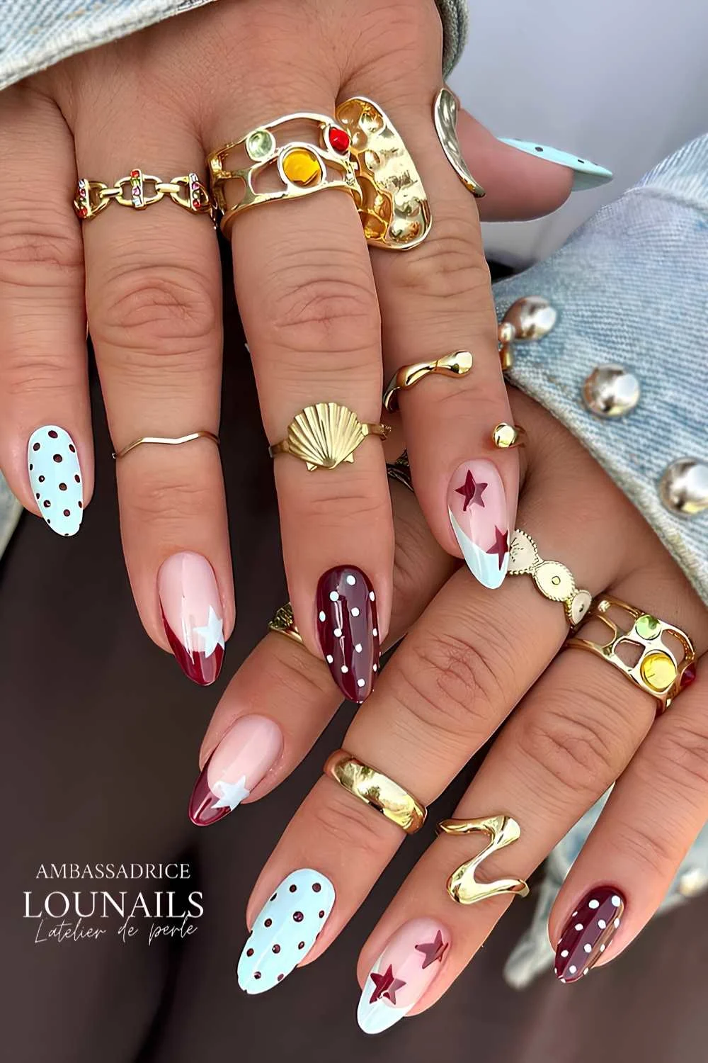 Brown and blue nails with stars and polka dots