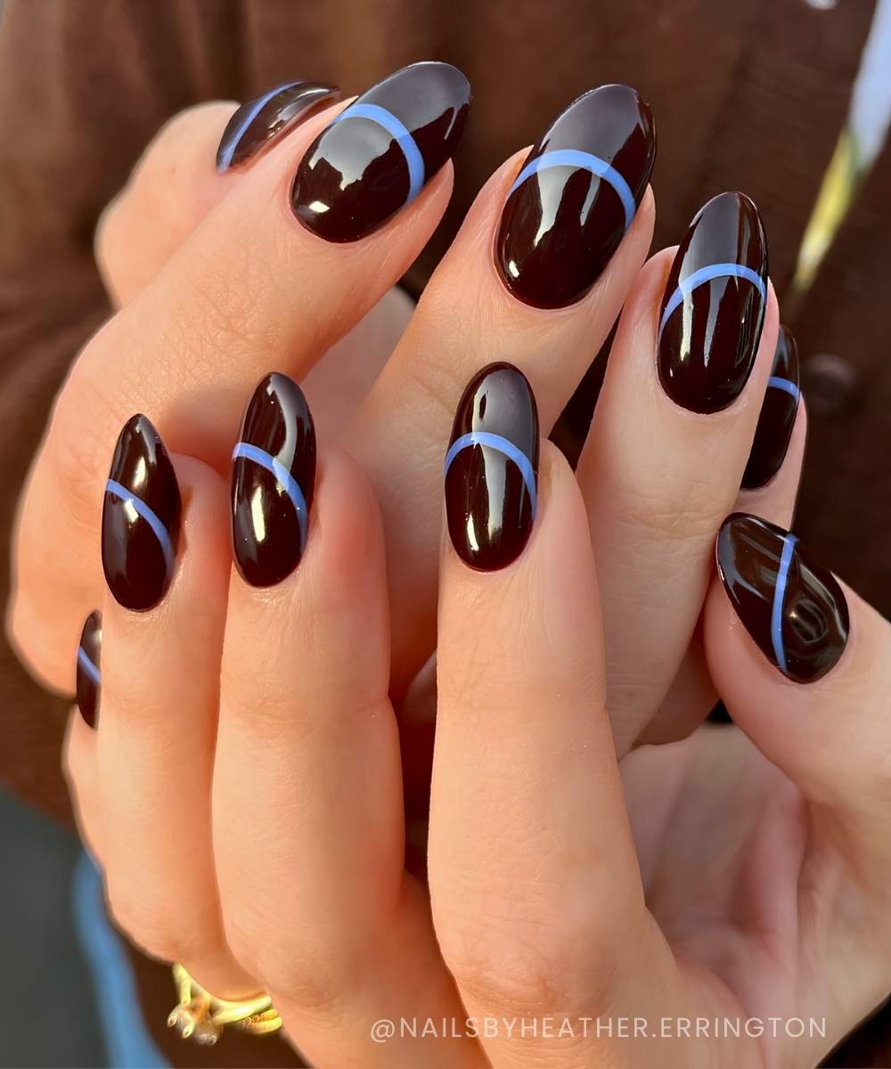Brown nails with blue French outline