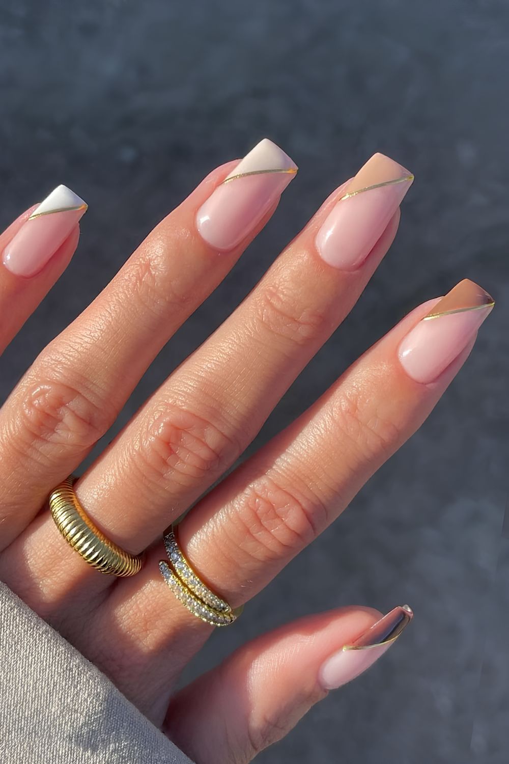 Brown to white side French tips with gold chrome outline