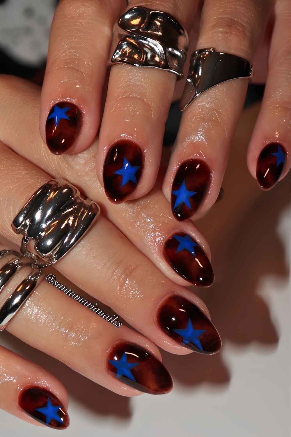 Brown tortie nails with cobalt stars