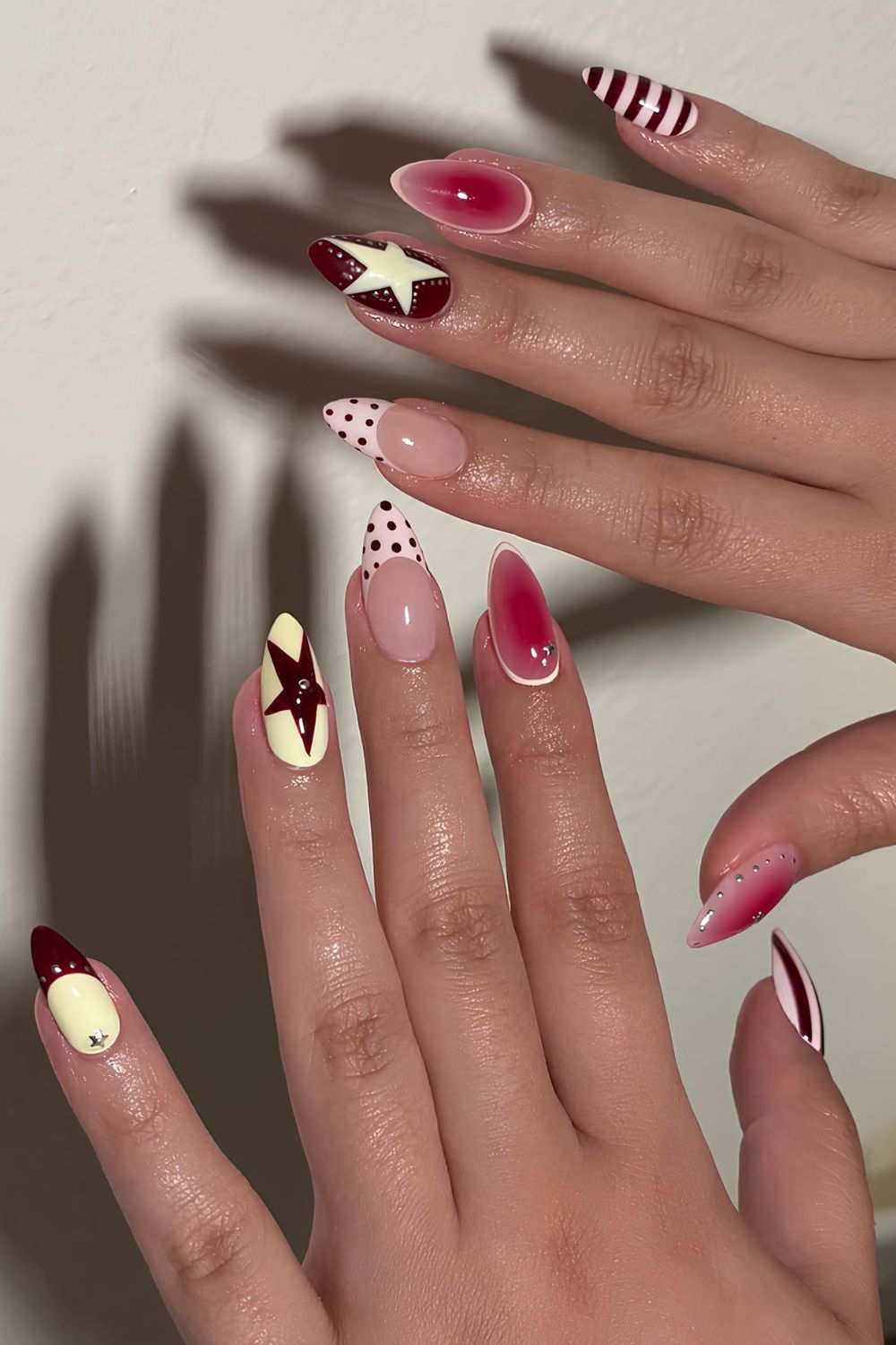 Burgundy and creamy mani with mix and match design