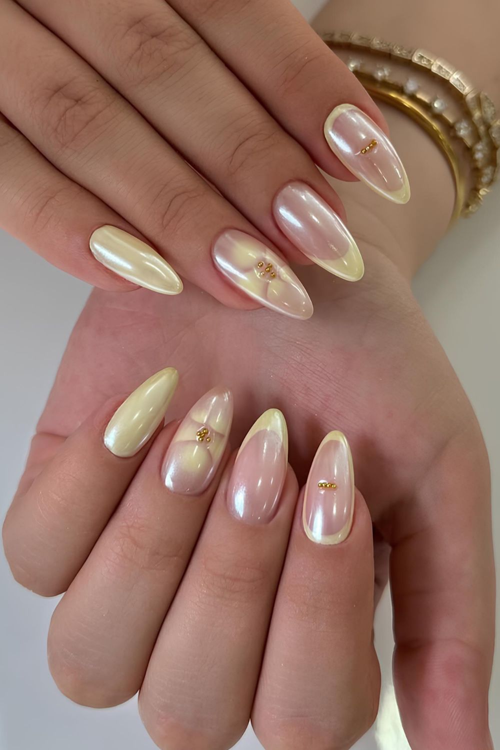 Chrome butter yellow mani with blooming florals