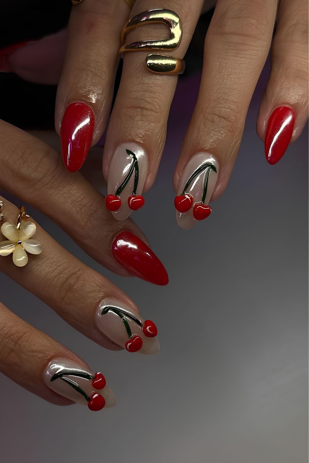 Chrome red nails with 3d cherry accents