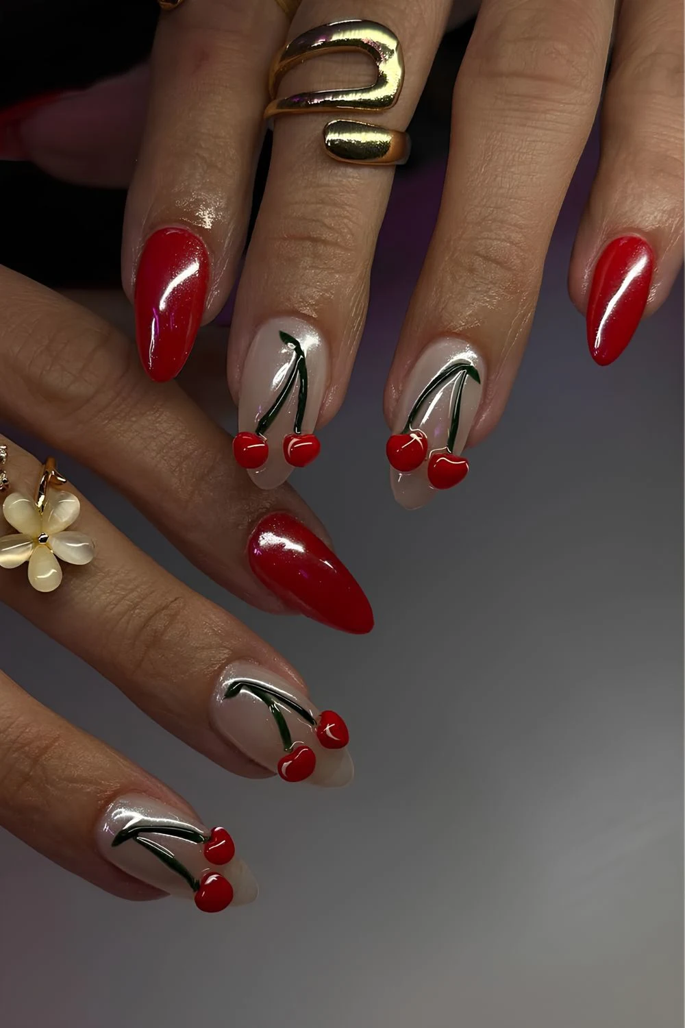 Chrome red nails with 3d cherry accents