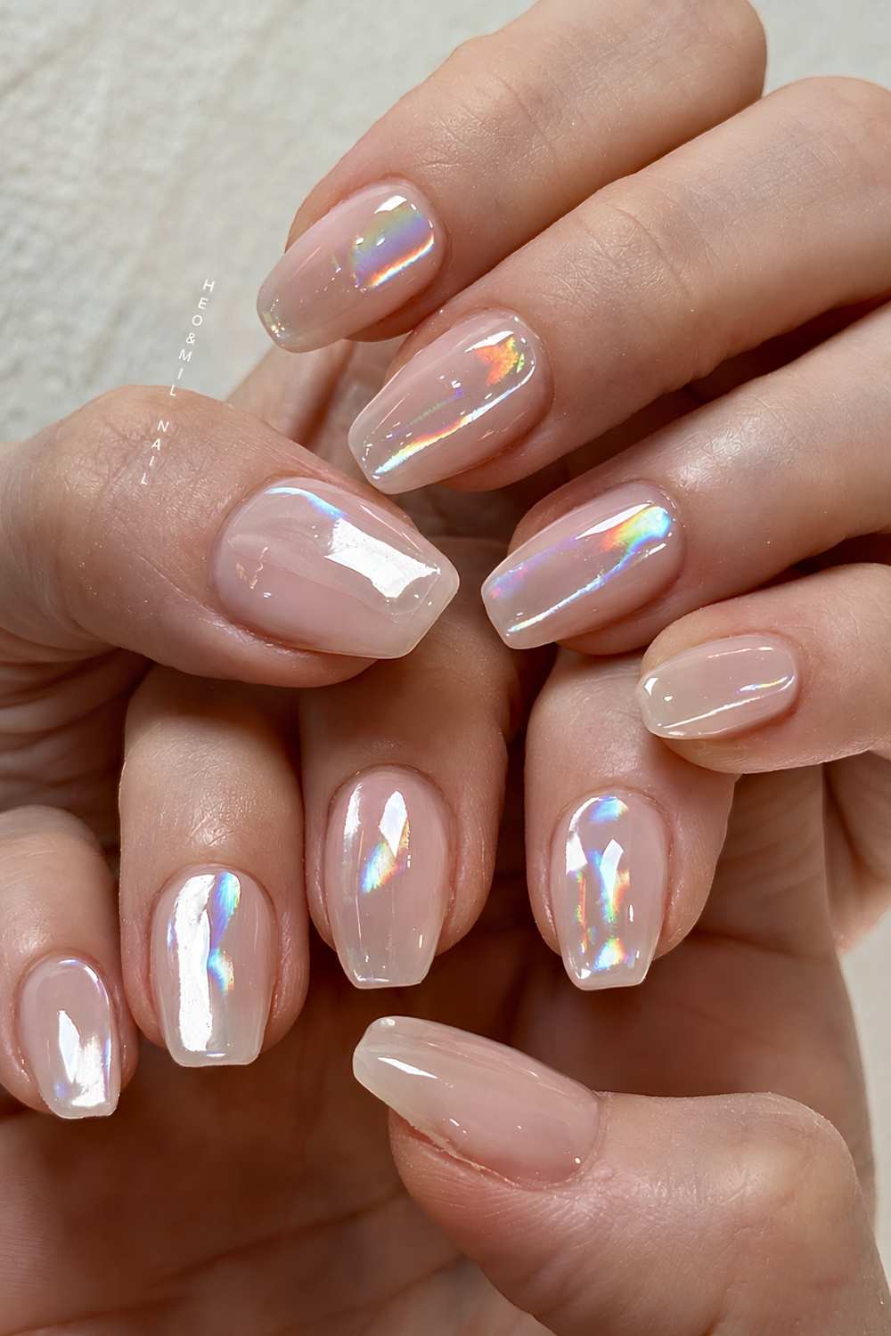 Clear aurora chrome finish nails