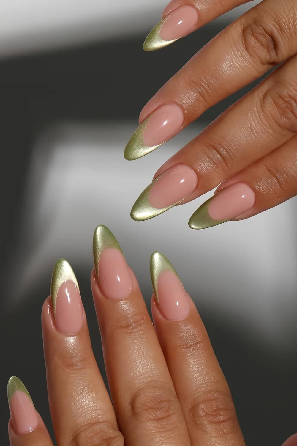 Green cat-eye French tip nails