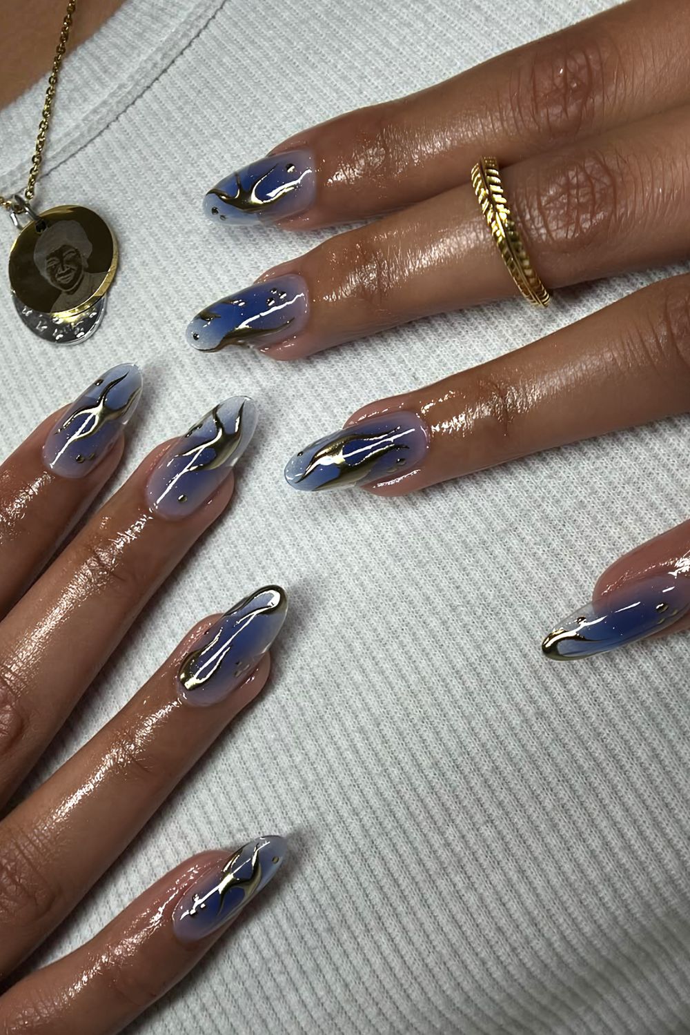 Jelly navy blue almond mani with silver chrome accents