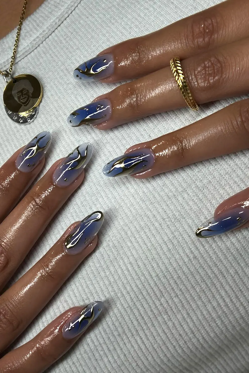 Jelly navy blue almond mani with silver chrome accents