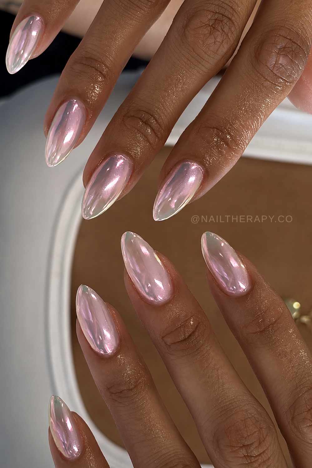 Metallic aurora chrome manicure