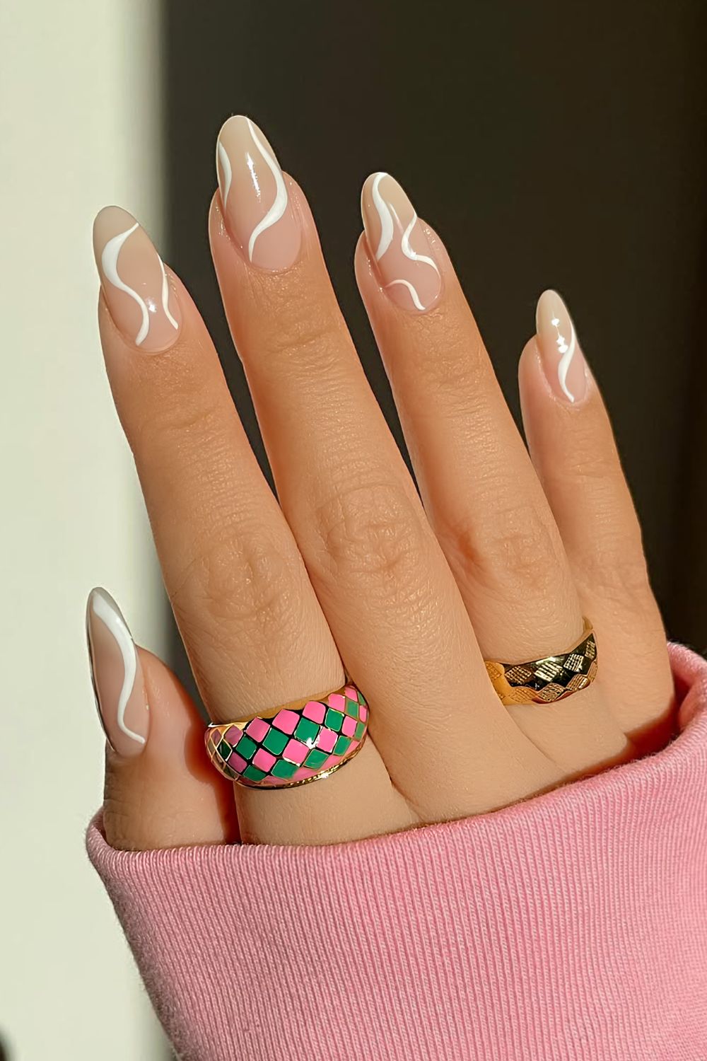 Milky almond mani with white swirls