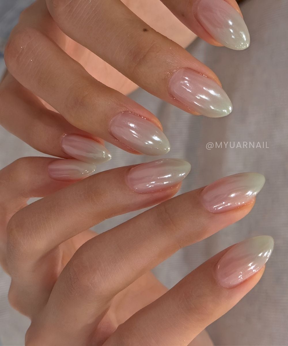 Muted green chrome ombre nails