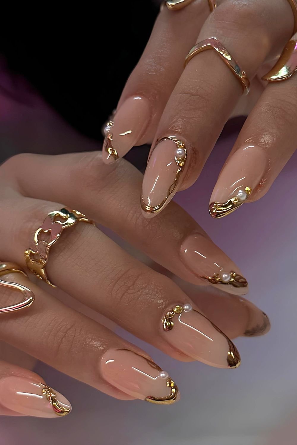 Neutral nails with gold chrome rings