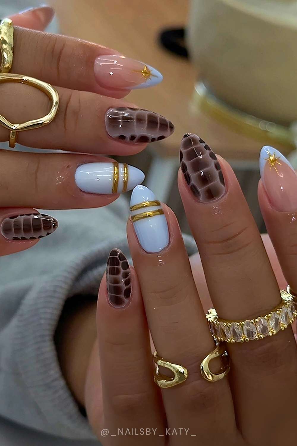 Pastel blue mani with brown animal print