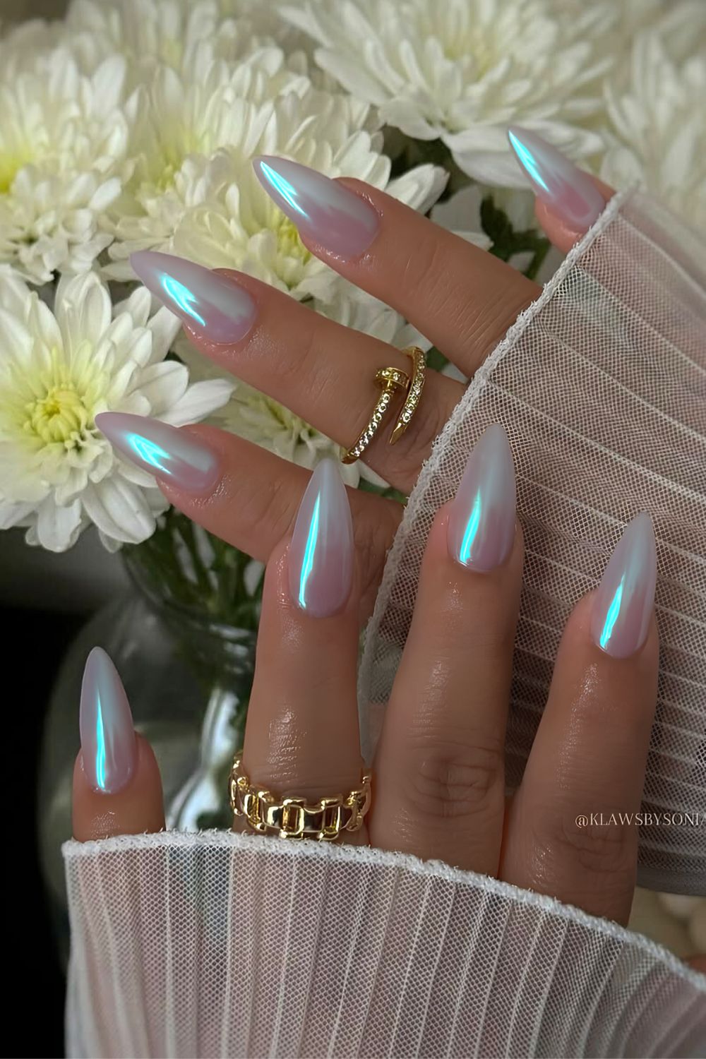 Pearlescent light blue aurora nails